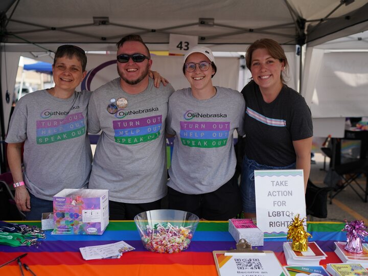 outnebraska volunteers at booth
