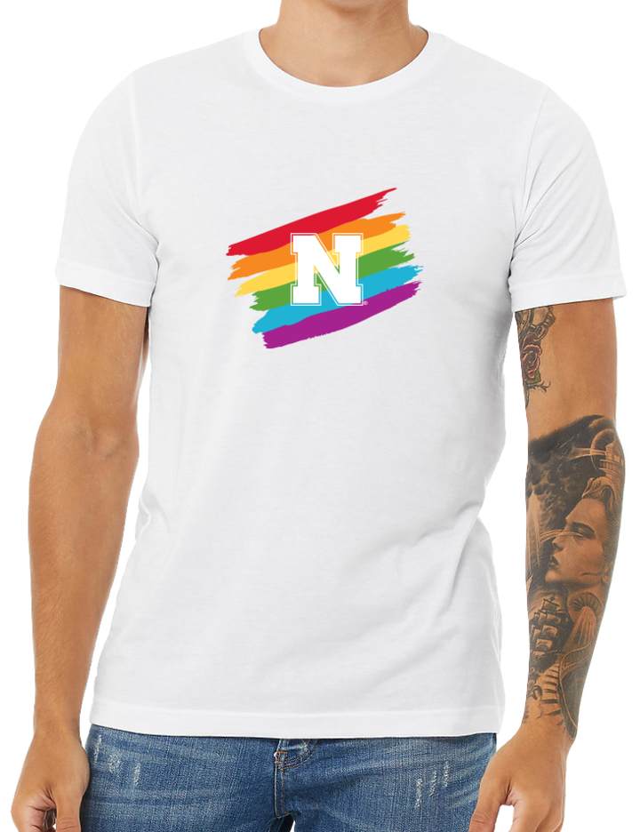 pride shirt on model, rainbow strips behind white N